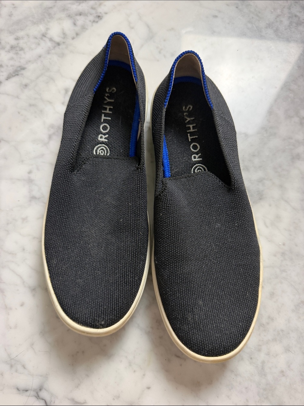 Rothy's Black Slip-On Loafers with Blue Trim